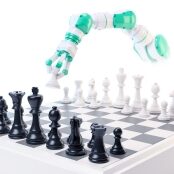 An industrial robot playing chess